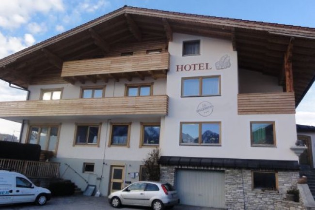 Sandstrahlung Holzfassade Hotel Bergkristall Schladming